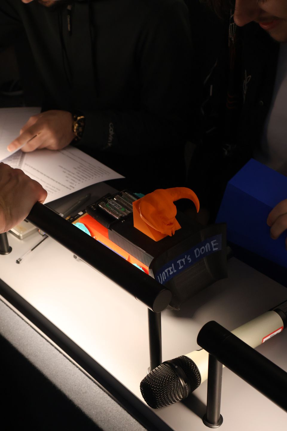 A small part being produced inside a desktop 3D printer.